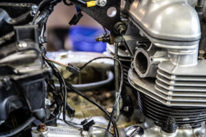 Now the OEM Triumph carburetors are removed and the wires can be cleaned up and tucked away. 